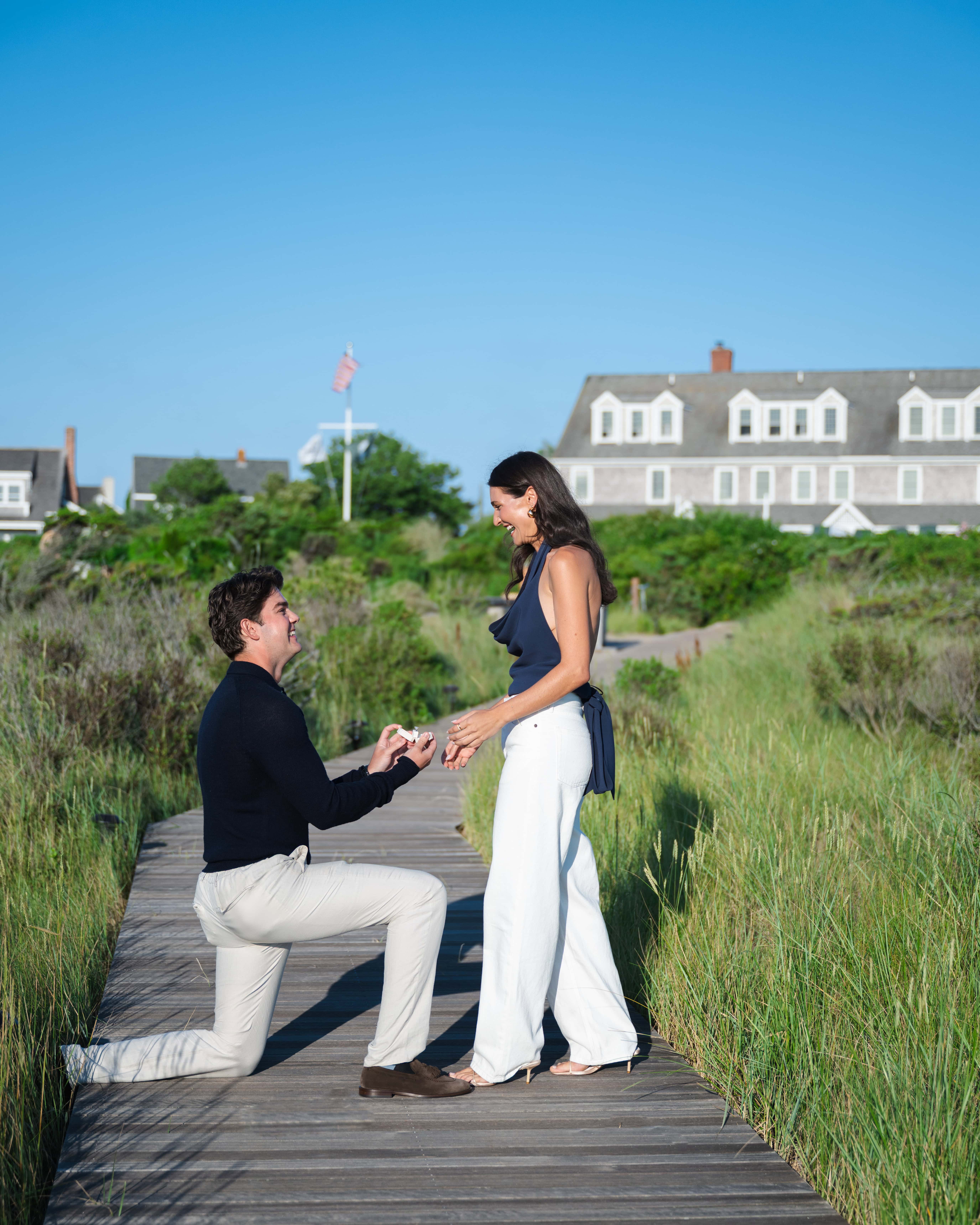 The moment of the proposal at The Wauwinet Nantucket wedding photographer Perla Images